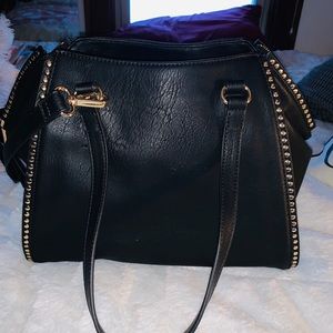 INC black purse with extended side strap